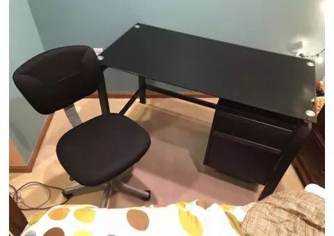 Desk, rolling chair, and mat